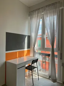 Chambre à louer dans un appartement en colocation à Vérone
